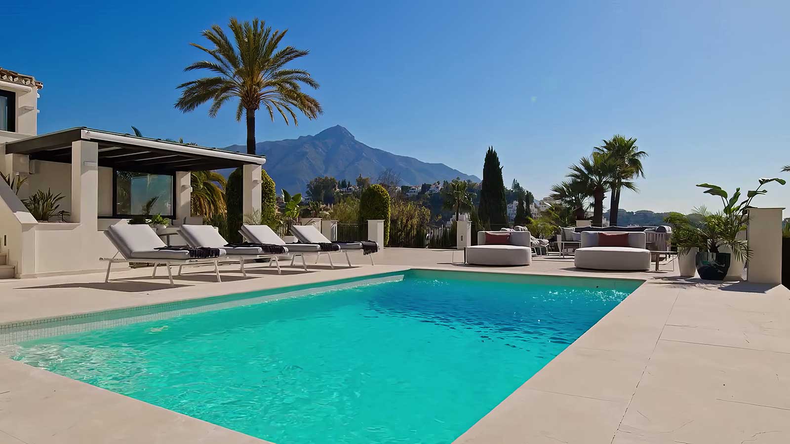 Outdoor spaces at Villa Seraphina in Los Naranjos Hill Club, Marbella, with panoramic views of La Concha mountain and the Mediterranean Sea.