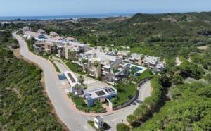 Aerial view of the Altezza Suites Estepona complex and surrounding nature.