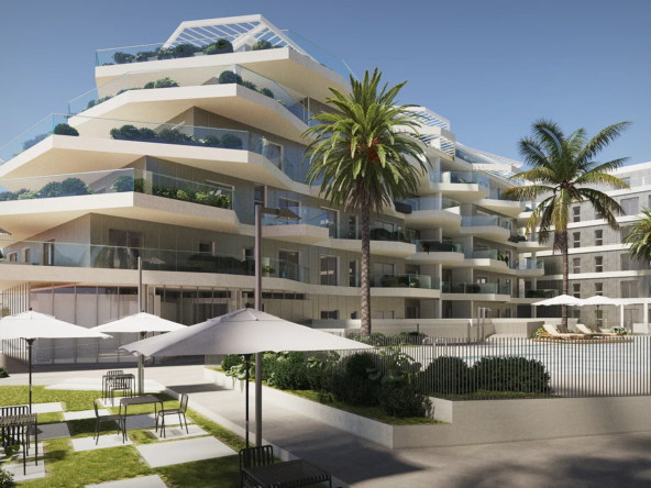 Modern luxury apartment complex with terraces and palm trees in Fuengirola, Mijas Costa