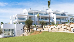 Contemporary white facade of Altezza Suites in Estepona.