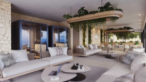 Modern indoor social lounge at Altezza Suites Estepona with greenery and comfortable seating.