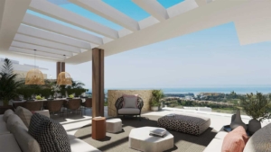 Modern outdoor lounge area at Altezza Suites Estepona with panoramic sea views.