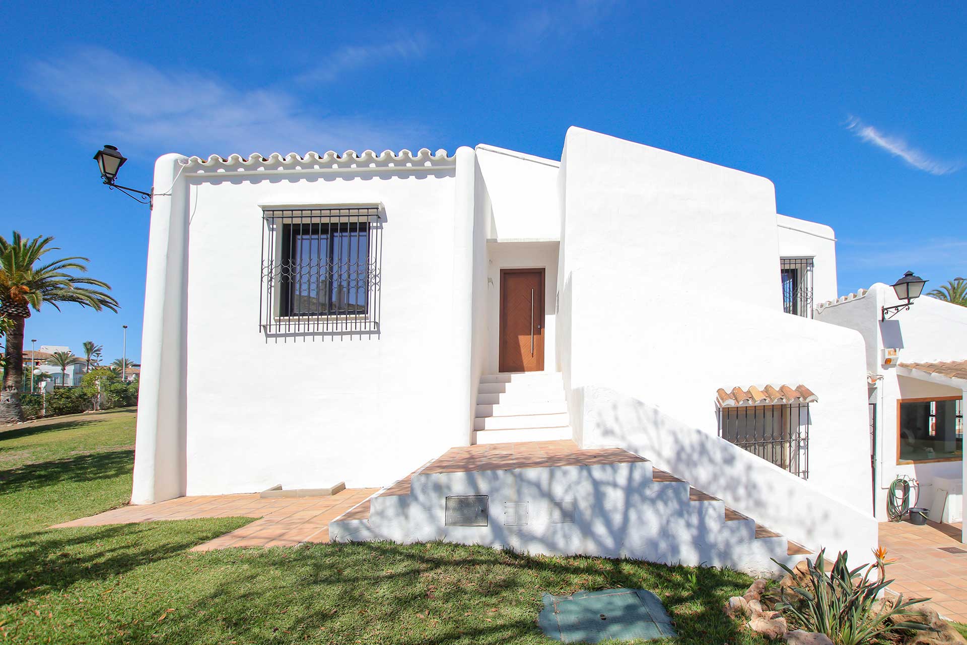 Exterior view of modern white penthouse building in Centro Plaza, Marbella.