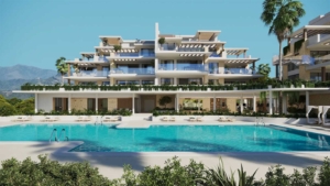 Large resort-style outdoor pool at Altezza Suites Estepona with mountain views. Caption: The luxurious resort-style pool at Altezza Suites Estepona, offering a relaxing retreat with mountain views.