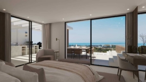 Elegant bedroom with floor-to-ceiling windows and sea views at Altezza Suites Estepona.