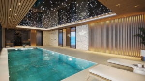 Indoor heated pool with elegant lighting at Altezza Suites Estepona.