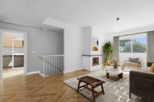 Bright living room in an Olimpo Mijas villa with modern furnishings and natural light.