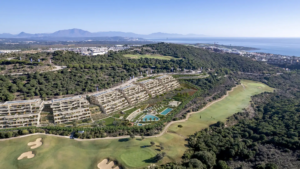 Aerial view of Atria F1 in La Alcaidesa, surrounded by golf courses and nature.
