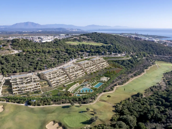 Aerial view of Atria F1 in La Alcaidesa, surrounded by golf courses and nature.