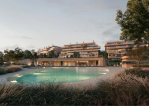Night view of Atria F1 with illuminated pool and garden areas.