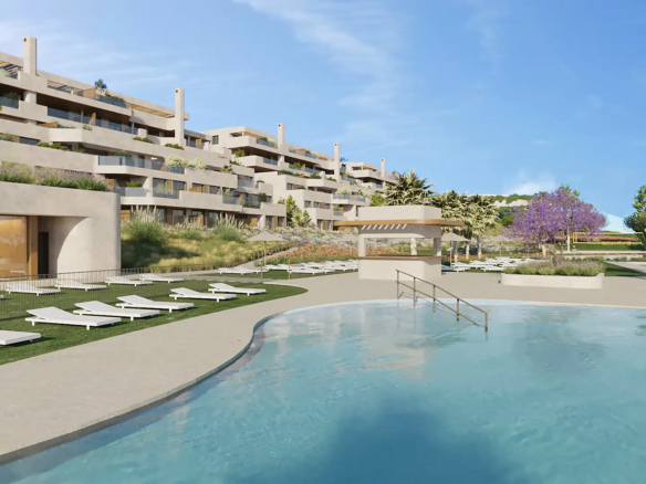 Luxurious pool area at Atria F1 with modern architecture in the background.