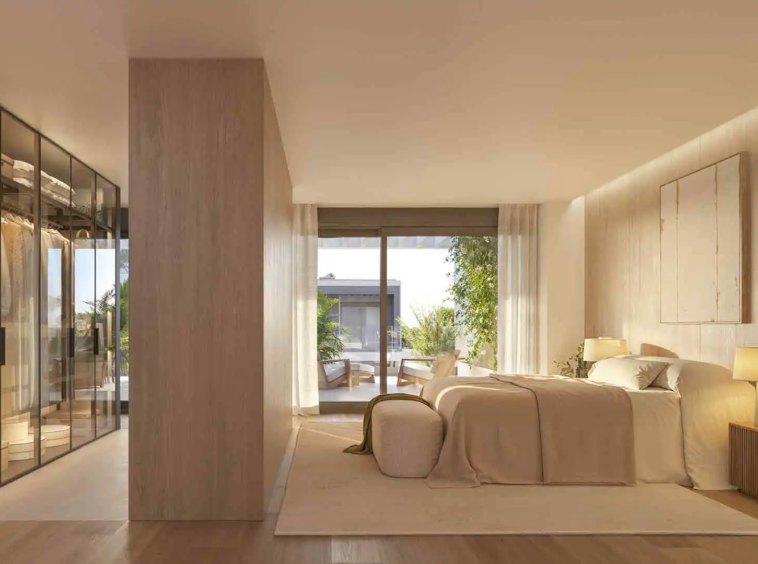 Elegant master bedroom with walk-in closet and terrace access at Isla Bela Marbella