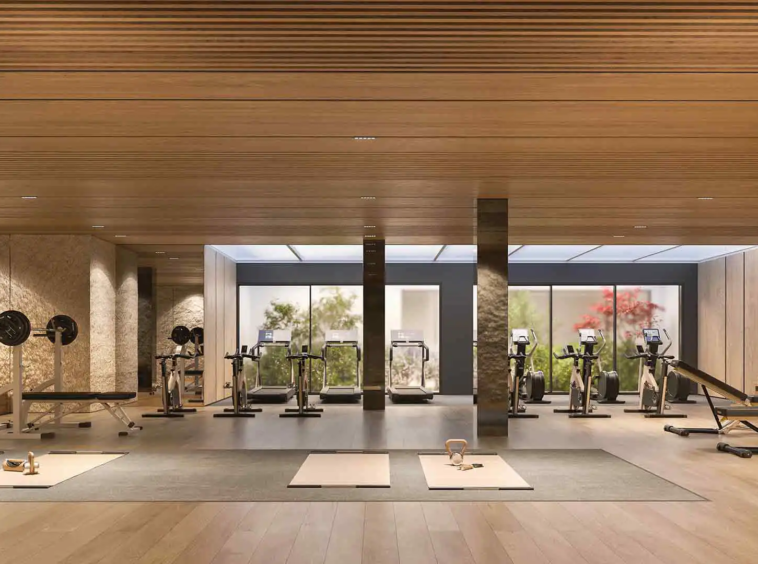 Luxury gym at Isla Bela Marbella with modern fitness equipment.