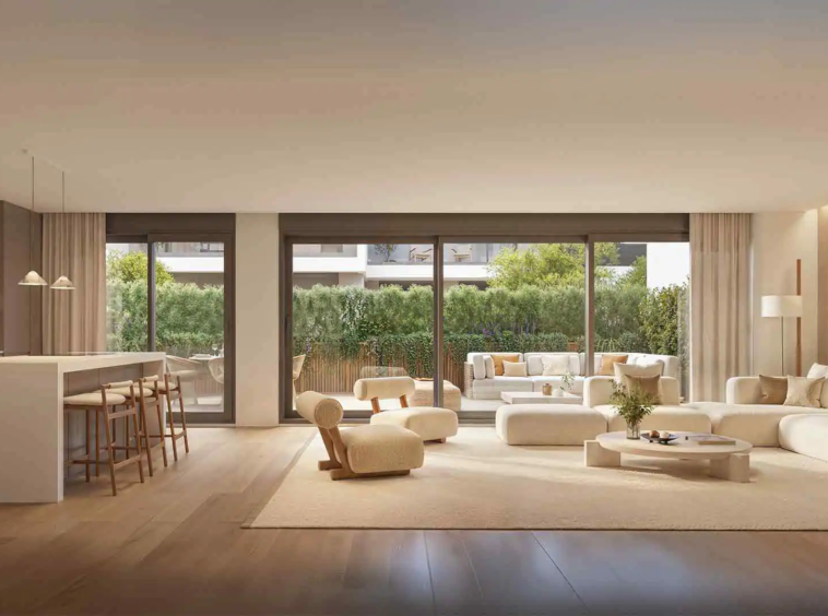 Stylish living room with open-plan design and garden access at Isla Bela Marbella.