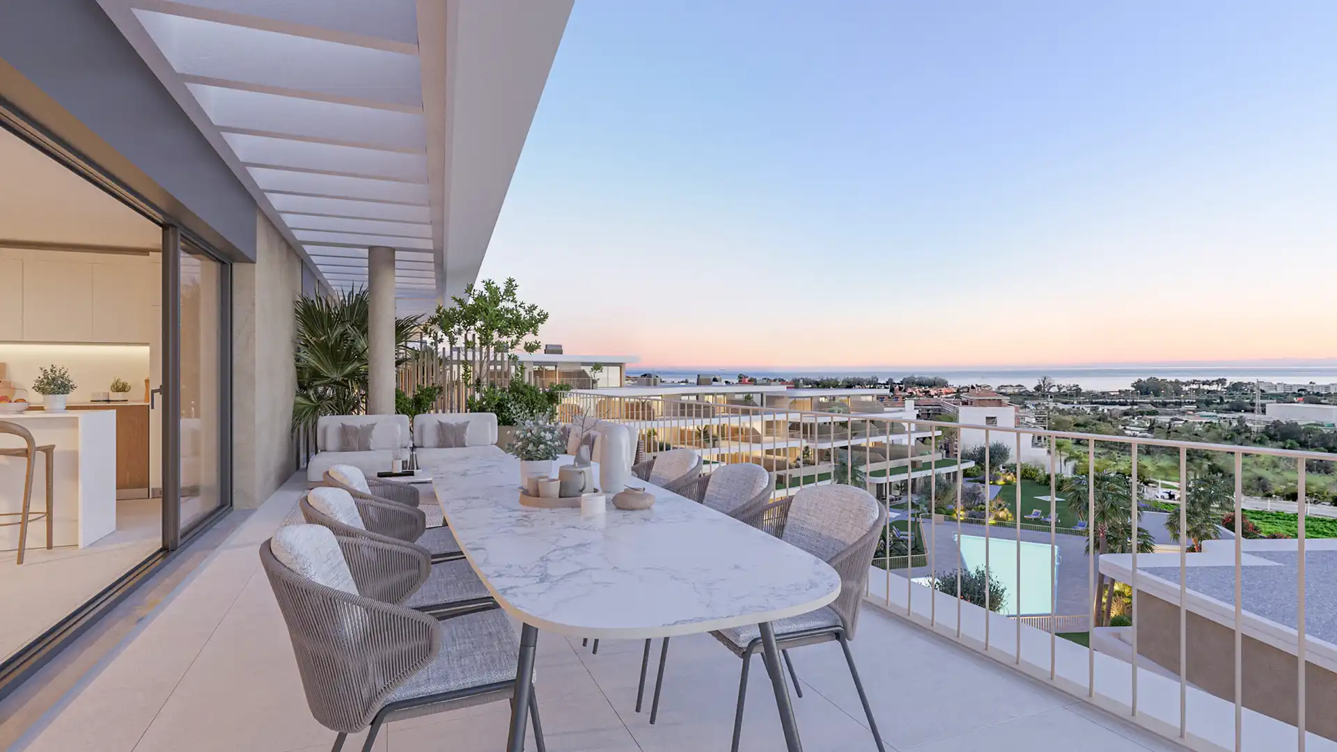 Spacious terrace at Adagio Estepona with panoramic sea views and outdoor dining area