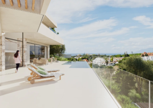 Spacious terrace with infinity pool and panoramic views of the Mediterranean at Aura Cabopino.