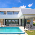 Modern white villa with private pool and covered terrace in Valle Romano, Estepona.
