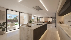 Open-plan luxury kitchen with marble island and dining area at Vasari Villas