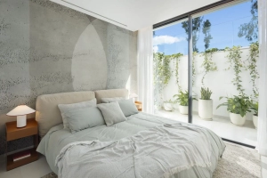 Elegant bedroom with large window and terrace views in Villa Tiza
