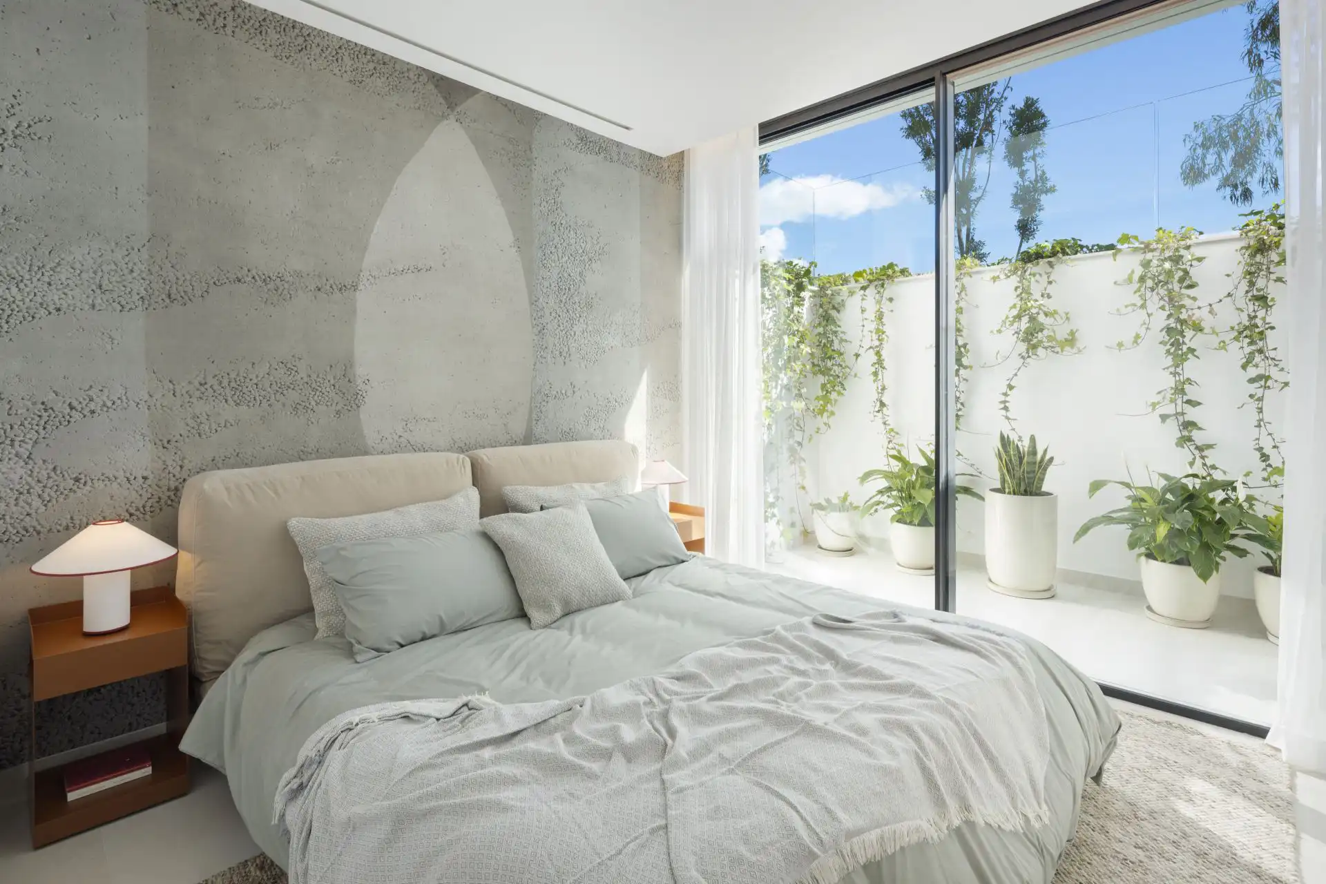 Elegant bedroom with large window and terrace views in Villa Tiza