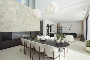 Modern open-plan kitchen and dining area with designer finishes
