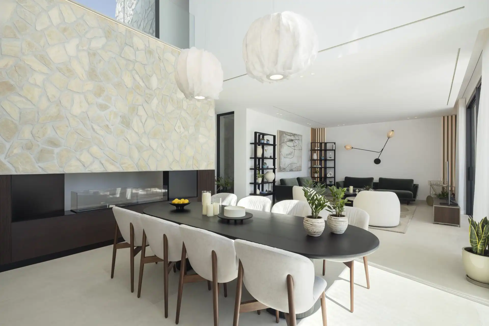 Modern open-plan kitchen and dining area with designer finishes