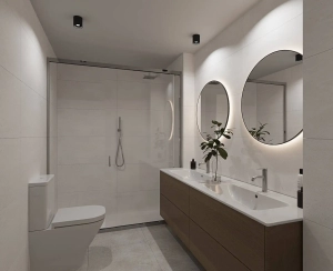 Designer bathroom with double sink and walk-in shower at Casares Bay, Costa del Sol