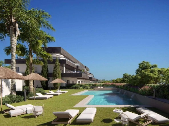 Outdoor swimming pool and landscaped gardens at Casares Bay new residential development