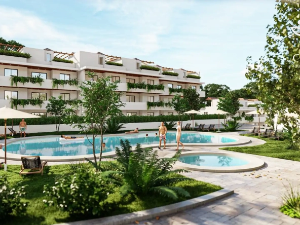 Coral Mijas residential pool area with people enjoying leisure time