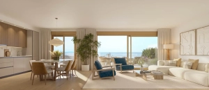 Interior of a modern living room featuring a sofa, chairs, and a dining area with a view of the ocean.