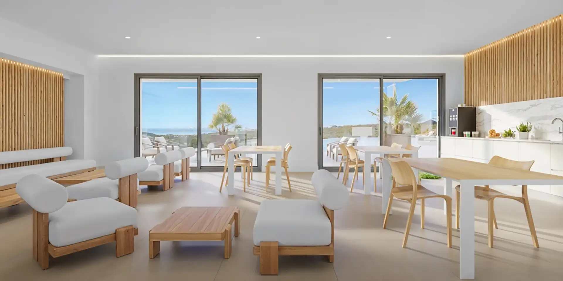 Modern communal lounge in Skye Casares Golf with minimalist design and views of the Mediterranean