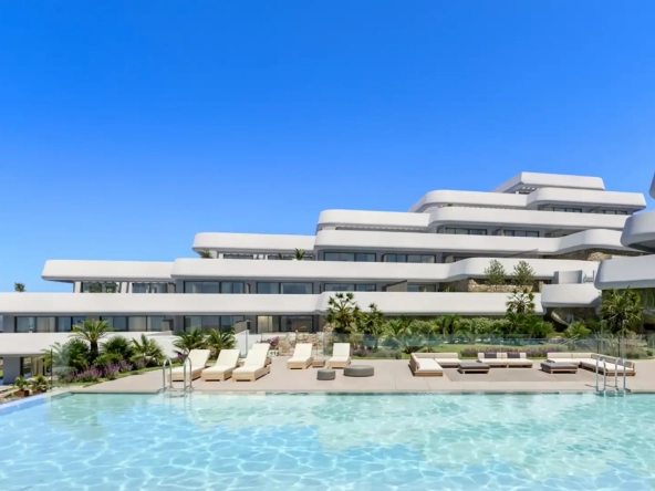 Infinity pool and modern architecture at Skye Casares Golf with sun loungers and gardens