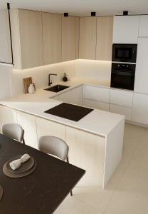 A modern kitchen featuring a white and wood finish with a sink, stovetop, and built-in appliances.