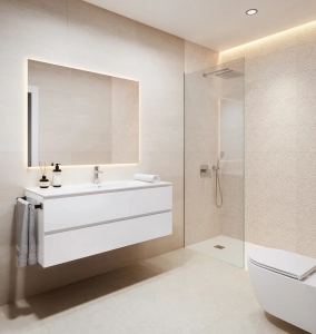 Modern bathroom featuring a wall-mounted vanity, a shower enclosure, and a large mirror with backlighting.