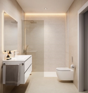 Contemporary bathroom featuring a glass shower, wall-mounted vanity, and neutral tile design.