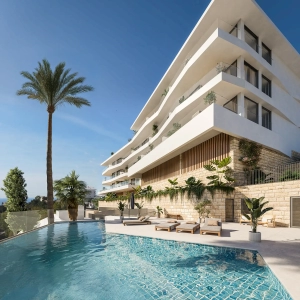 Contemporary apartment building featuring a swimming pool and palm trees in the foreground.