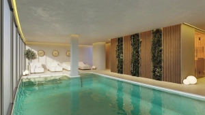 Indoor swimming pool with clear water and a modern design featuring wooden accents.