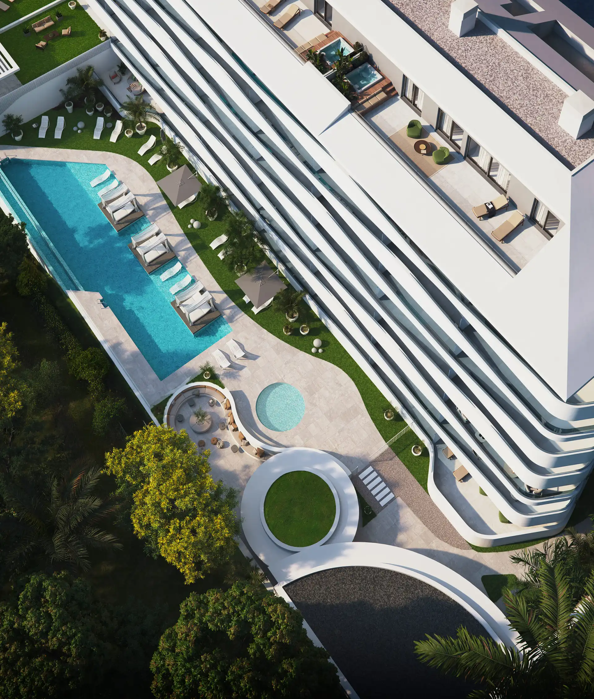 Aerial view of a modern residential building featuring a swimming pool and landscaped outdoor area.