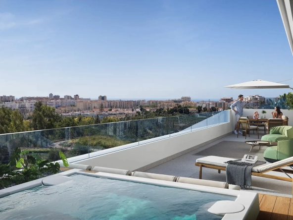 7 olas fuengirola Balcony featuring a hot tub, seating area, and panoramic view of a cityscape under a clear blue sky.