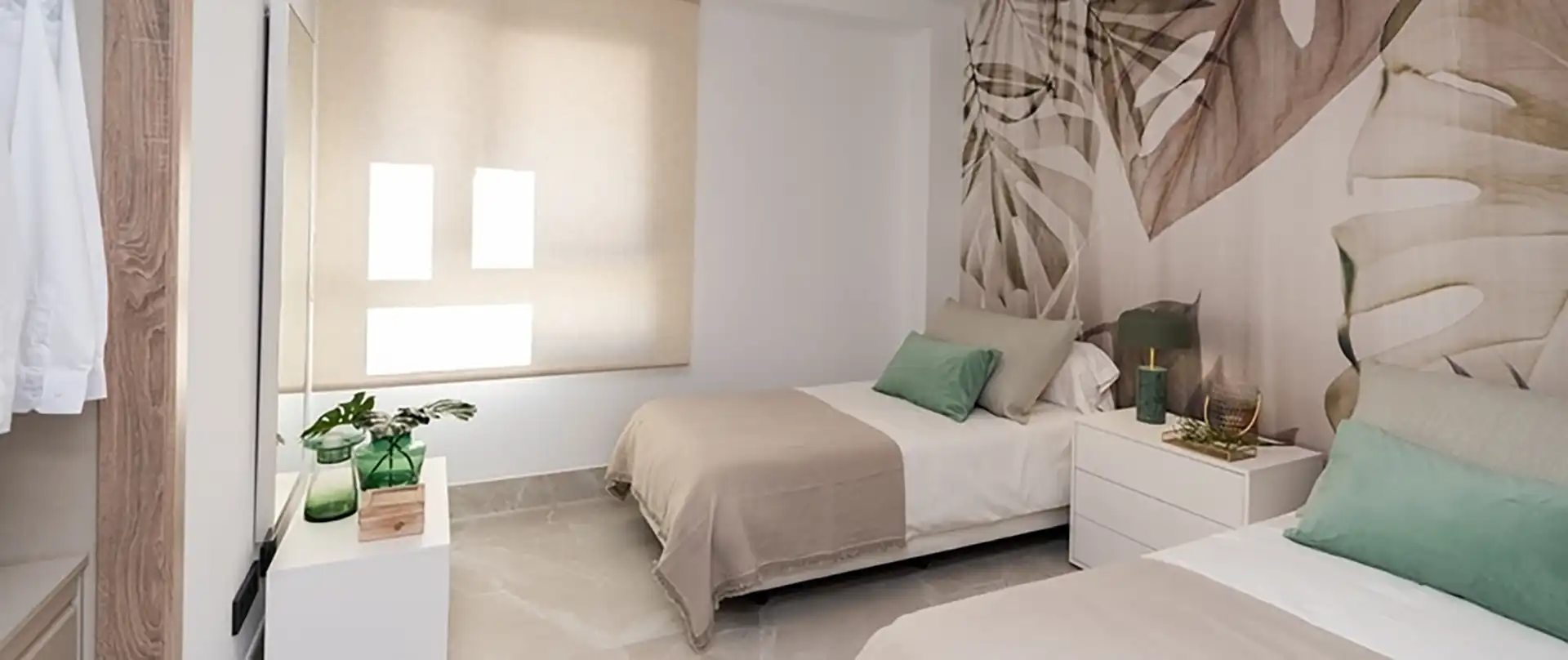 Modern minimalist luxury bedroom with nature-inspired design at Almazara Gardens Istán Costa del Sol