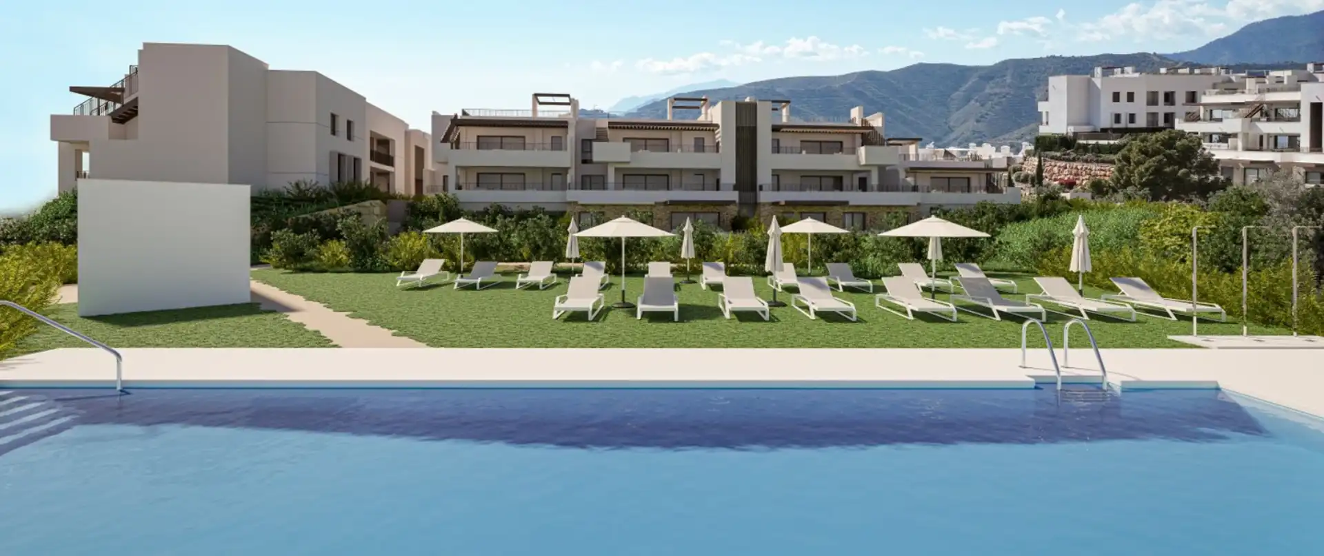 Modern resort-style swimming pool and communal gardens with mountain views at Almazara Gardens Istán