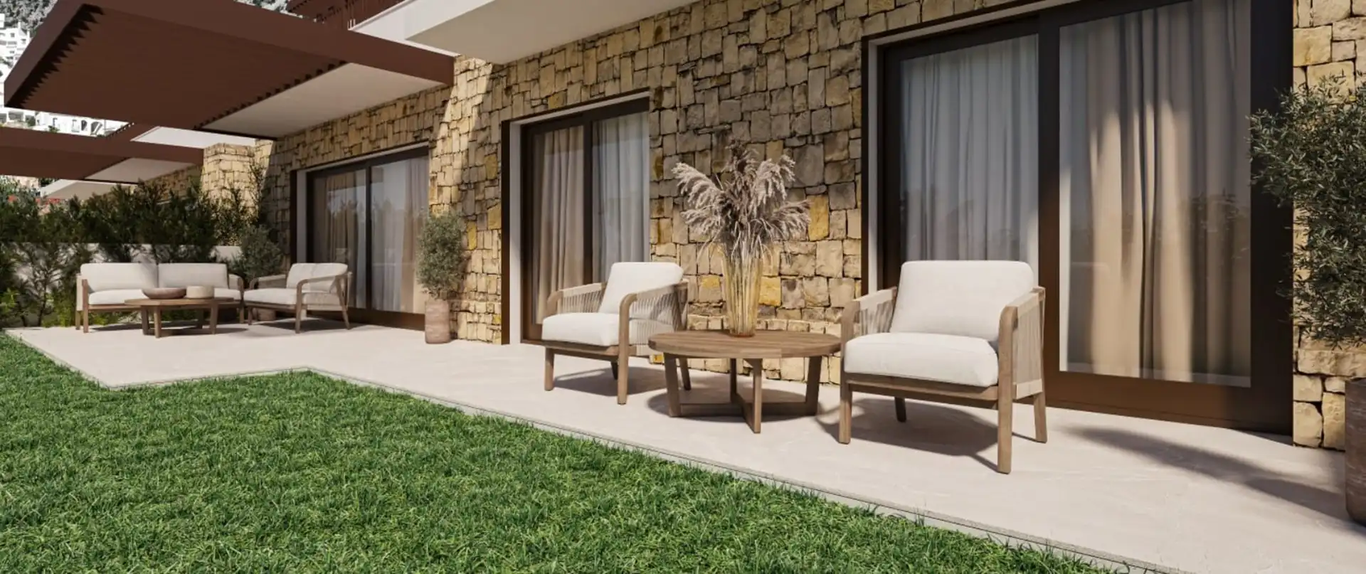 Modern stone terrace with outdoor lounge and panoramic views at Almazara Gardens Istán
