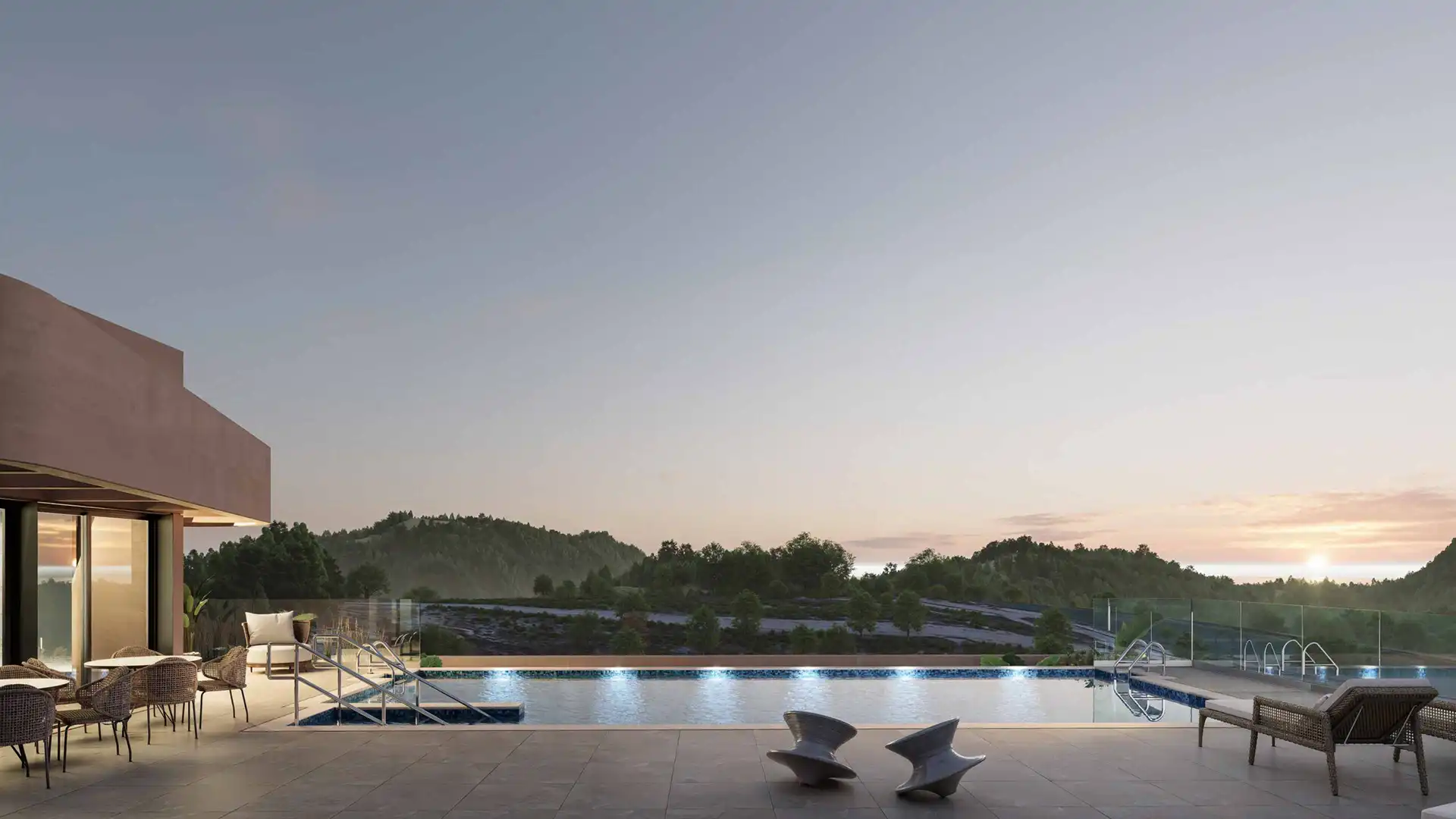 Moderne tagterrasse med pool ved skumringstid Eagle Hills Luksusudvikling i Estepona