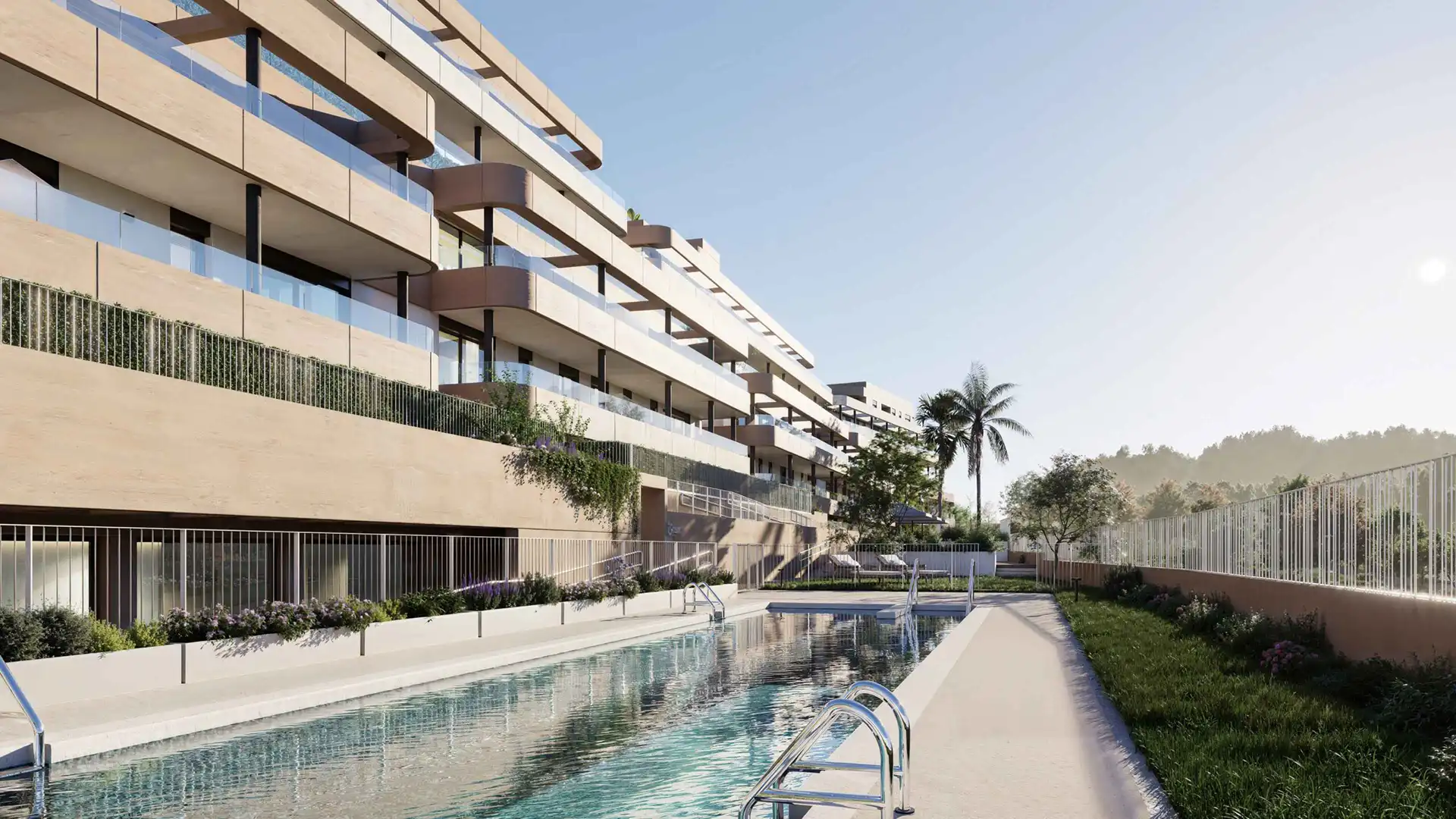 Moderne boligkompleks med lineær swimmingpool og terrasser ved Eagle Hills Estepona