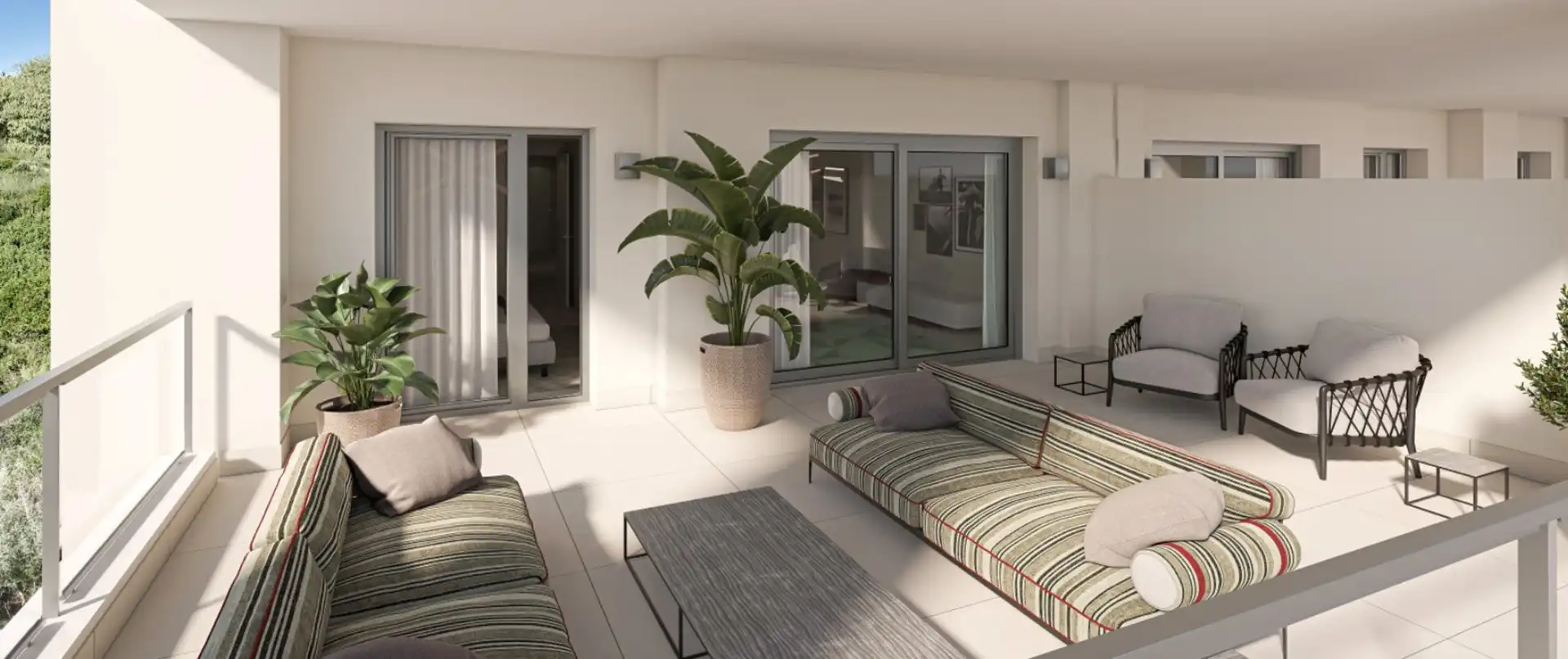 Modern terrace with outdoor lounge area and sea views in Manilva new development