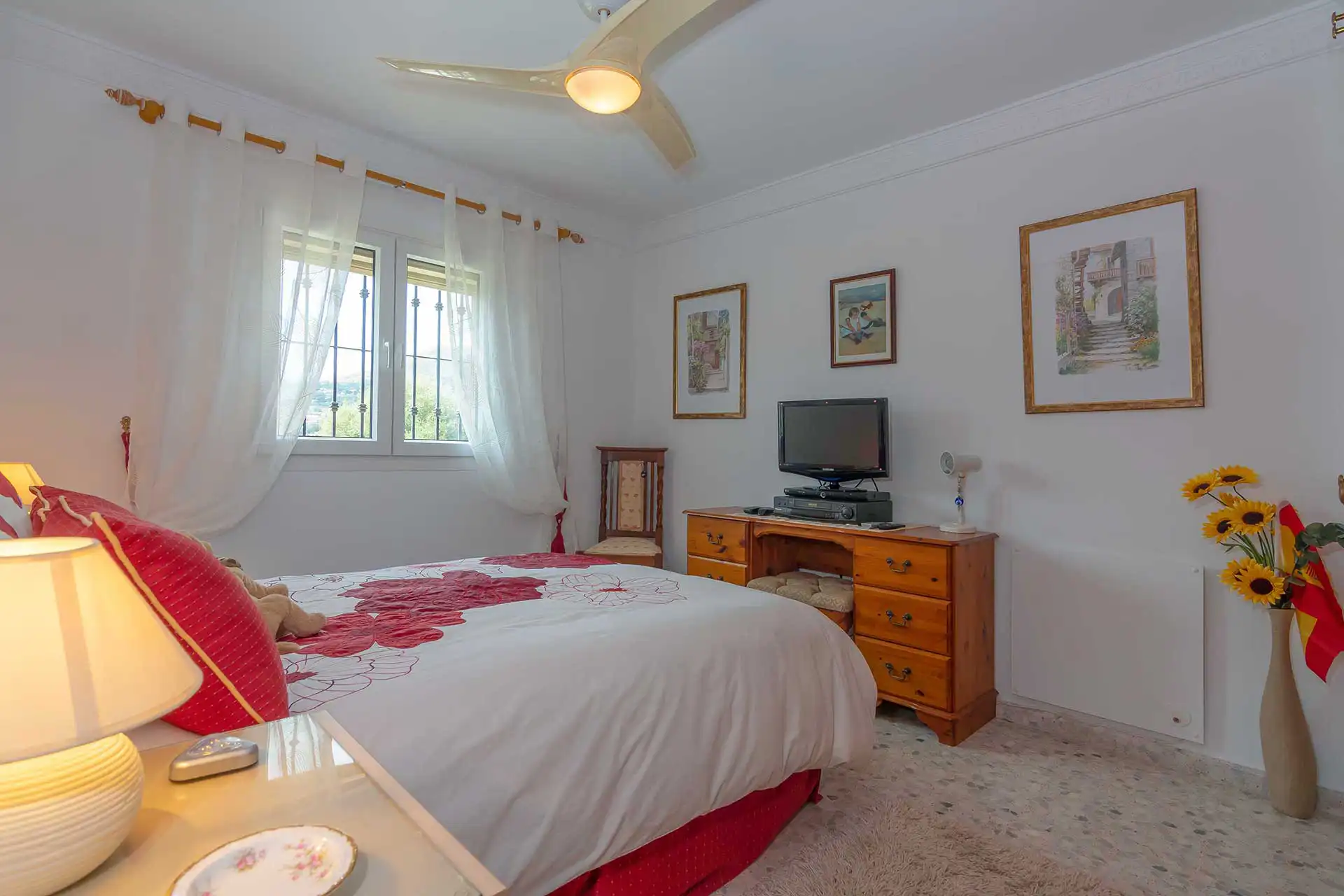 Covered terrace and outdoor dining area at Villa Altos de Estepona