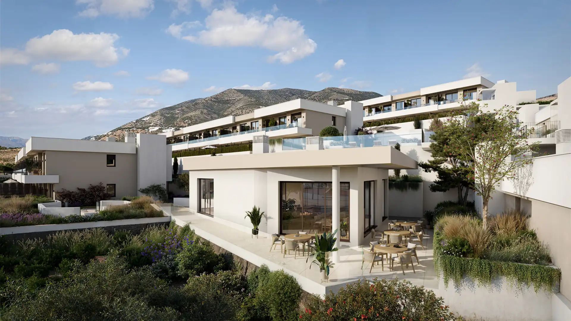 Modern Mediterranean villa development in Fuengirola hillside setting with sea and mountain views