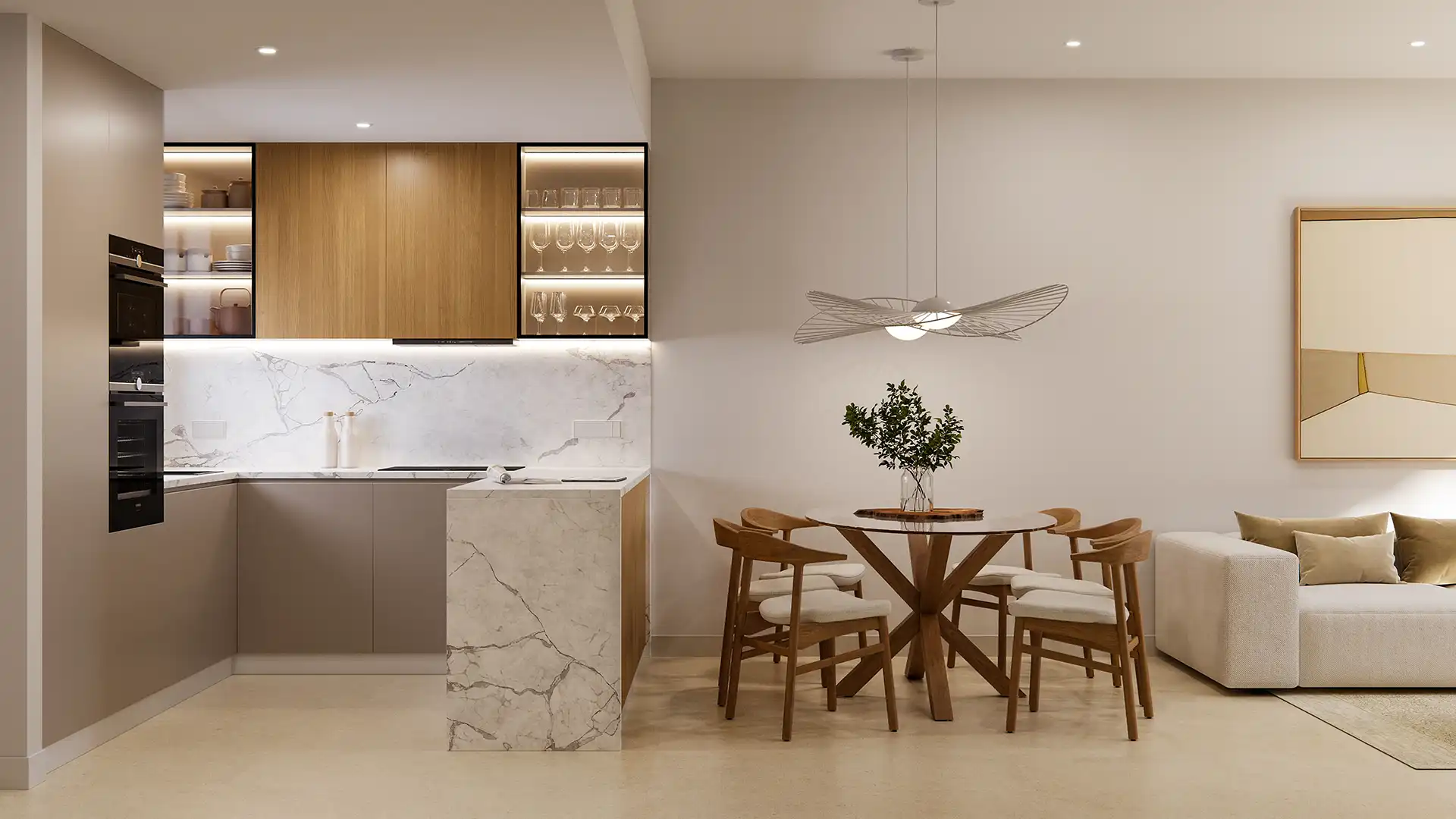 Cucina moderna a pianta aperta con zona pranzo e finiture in marmo.