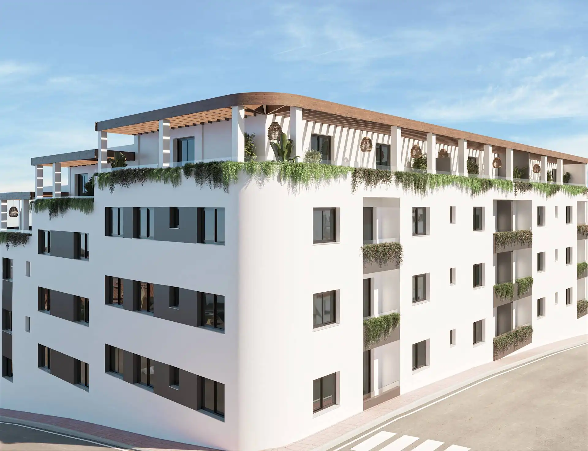 White apartment building with rooftop terrace and communal areas