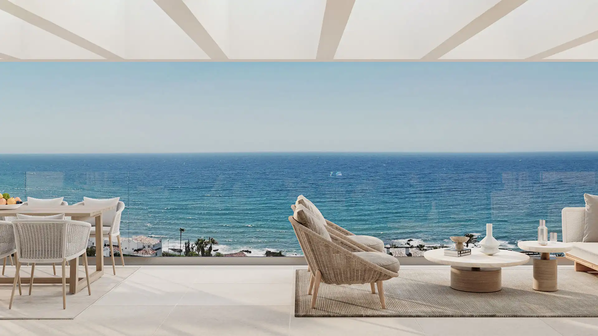 Evening exterior view of a contemporary apartment complex on the Mijas coastline